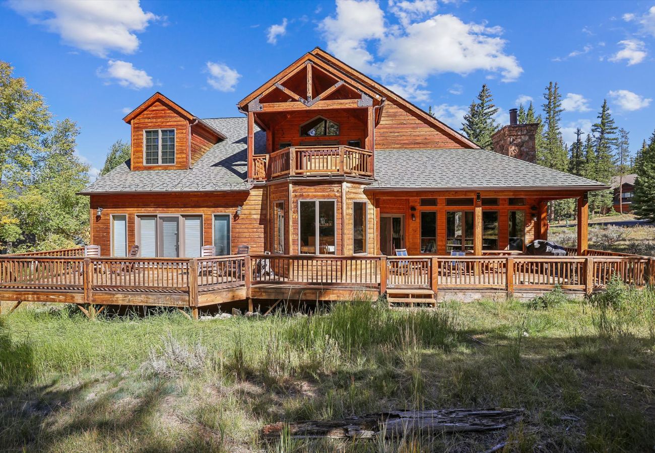 outdoor deck with BBQ grill and outdoor seating