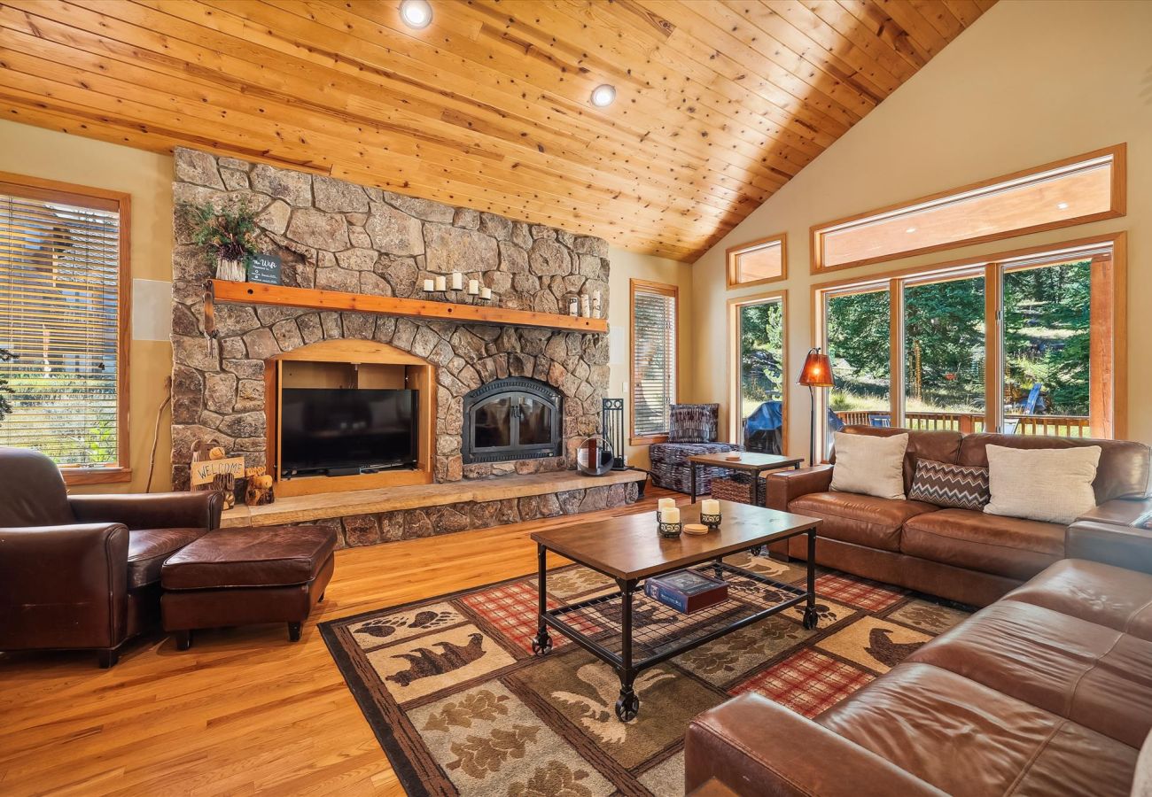 cozy living room with wood burning fireplace